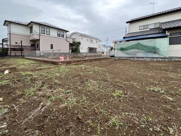 引渡し後、売主負担で駐車場2台分造成